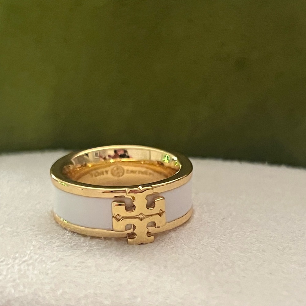 a Tory Burch Icon Enamel Ring in 18k-gold plated brass and white enamel